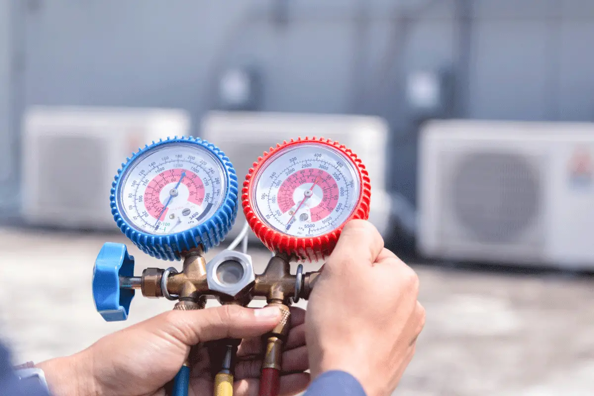 Technician checking refrigerant flammability